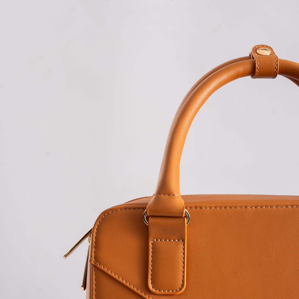 Tan laptop bag handles