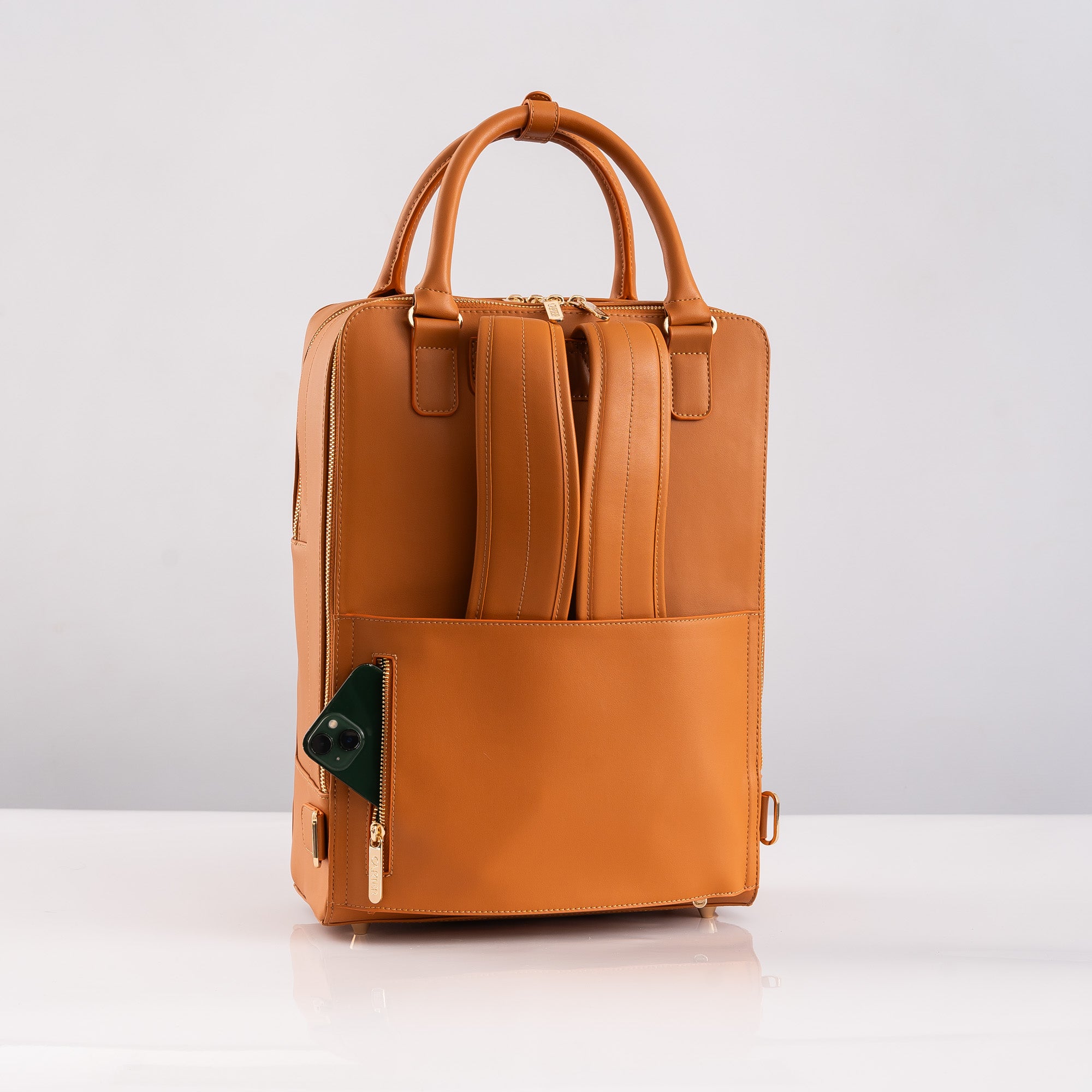 tan laptop bag with luggage strap